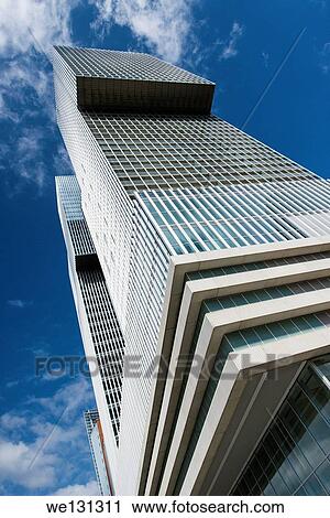 Rotterdam, Netherlands. The recently finished tower and skyscraper ´The Rotterdammer´ dominates the south shore of de Nieuwe Maas and the skyline in Rotterdam. It has the largest amount of floorspace of any building in Netherlands. View Large Photo Image Stock Image - Rotterdam, Netherlands. The recently finished tower and skyscraper ´The Rotterdammer´ dominates the south shore of de Nieuwe Maas and the skyline in Rotterdam. It has the largest amount of floorspace of any building in Netherlands.. Fotosearch