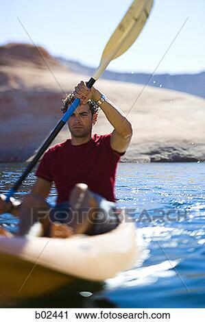 A young man kayaking View Large Photo Image Stock Image - A young man kayaking. Fotosearch