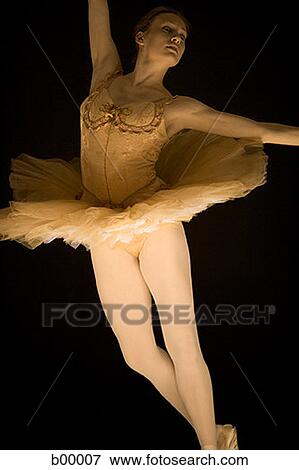 Stock Photo - Ballerina in tutu dancing. Fotosearch