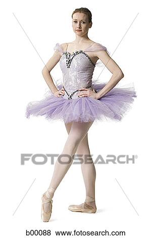 Ballerina standing with arms akimbo View Large Photo Image Stock Photo - Ballerina standing with arms akimbo. Fotosearch