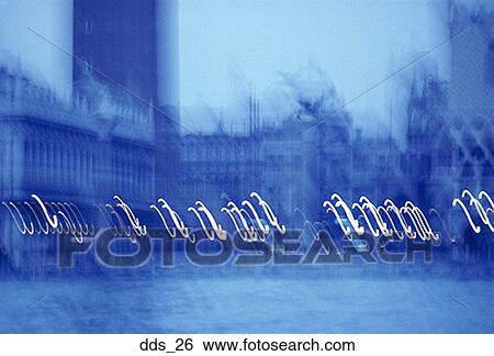 Blurred view of buildings at night View Large Photo Image Stock Photograph - Blurred view of buildings at night. Fotosearch