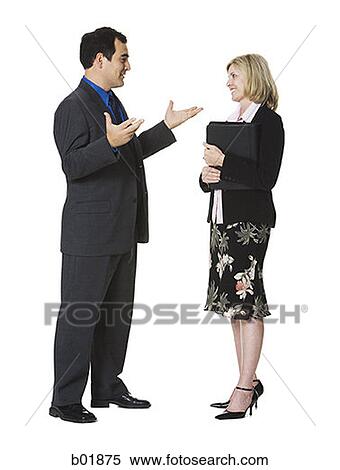 Stock Photography - Businessman and a businesswoman talking. Fotosearch