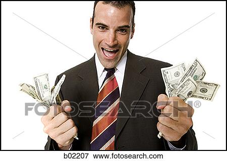 Businessman holding fists full of money View Large Photo Image Stock Photo - Businessman holding fists full of money. Fotosearch