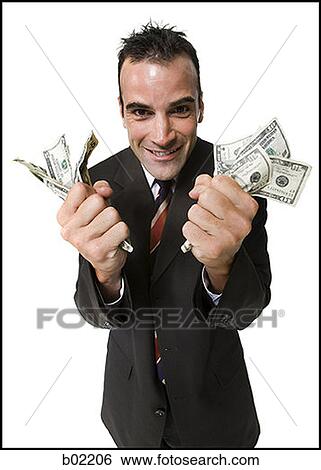 Businessman holding fists full of money View Large Photo Image Stock Photograph - Businessman holding fists full of money. Fotosearch