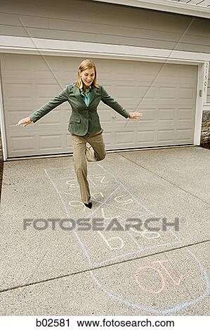 Businesswoman playing hopscotch View Large Photo Image Stock Image - Businesswoman playing hopscotch. Fotosearch
