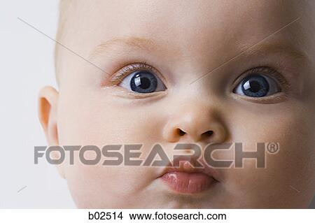Close-up of a baby girl View Large Photo Image Picture - Close-up of a baby girl. Fotosearch