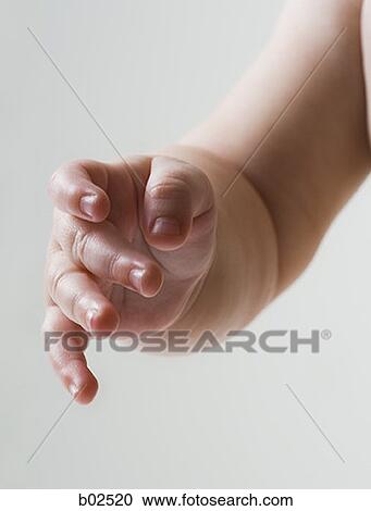 Close-up of a baby's hand View Large Photo Image Stock Image - Close-up of a baby's hand. Fotosearch