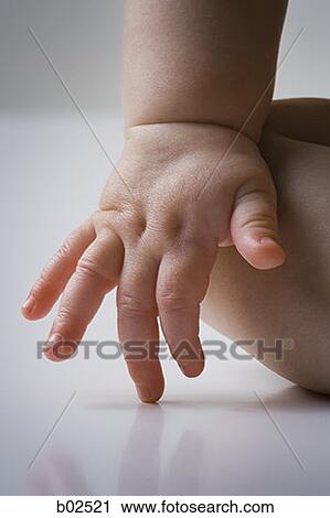 Close-up of a baby's hand View Large Photo Image Stock Image - Close-up of a baby's hand. Fotosearch