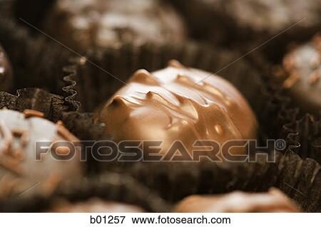 Close-up of a box of chocolates View Large Photo Image Stock Photo - Close-up of a box of chocolates. Fotosearch