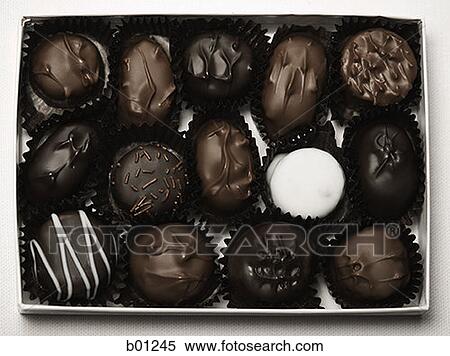 Close-up of a box of chocolates View Large Photo Image Stock Photography - Close-up of a box of chocolates. Fotosearch
