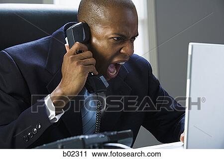Close-up of a businessman shouting on the phone View Large Photo Image Stock Image - Close-up of a businessman shouting on the phone. Fotosearch