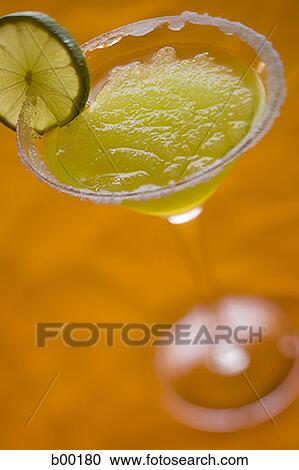 Close-up of a crush ice in a glass of martini View Large Photo Image Stock Image - Close-up of a crush ice in a glass of martini. Fotosearch