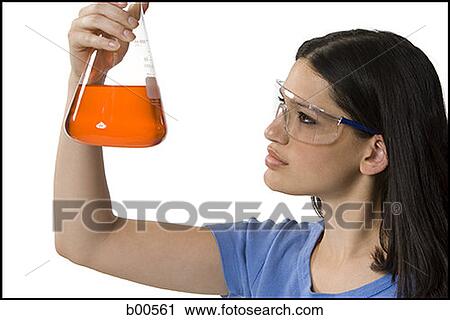 Close-up of a female technician holding a conical flask View Large Photo Image Stock Image - Close-up of a female technician holding a conical flask. Fotosearch