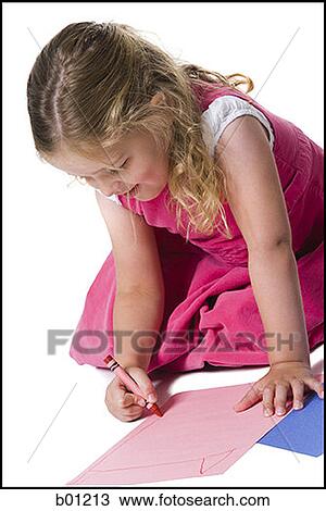 Close-up of a girl drawing on a sheet of paper View Large Photo Image Stock Image - Close-up of a girl drawing on a sheet of paper. Fotosearch