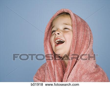 Close-up of a girl laughing with a blanket wrapped around her head View Large Photo Image Stock Photo - Close-up of a girl laughing with a blanket wrapped around her head. Fotosearch