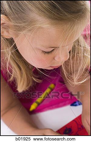 Close-up of a girl looking down View Large Photo Image Stock Photography - Close-up of a girl looking down. Fotosearch