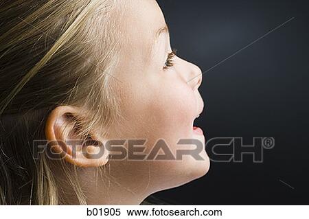 Stock Photography - Close-up of a girl's face. Fotosearch
