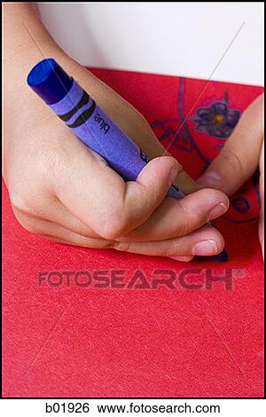 Close-up of a hand drawing with a crayon View Large Photo Image Stock Photograph - Close-up of a hand drawing with a crayon. Fotosearch