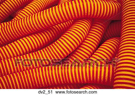Close-up of a heap of orange and red tubing View Large Photo Image Stock Image - Close-up of a heap of orange and red tubing. Fotosearch