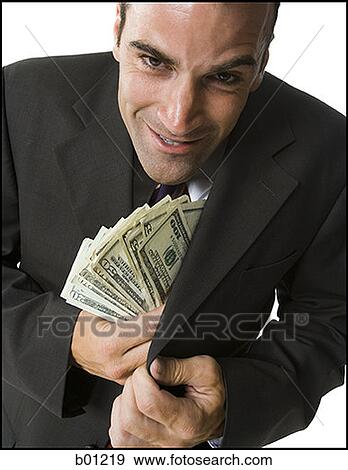 Stock Photo - Close-up of a man with money in his coat. Fotosearch