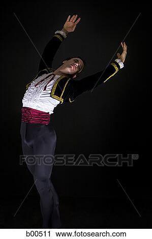Close-up of a mid adult man dancing View Large Photo Image Stock Image - Close-up of a mid adult man dancing. Fotosearch