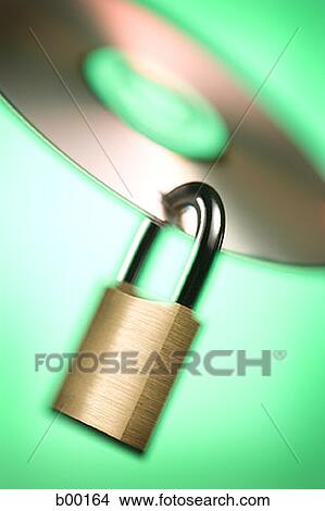 Close-up of a padlock hanging from a compact disk View Large Photo Image Picture - Close-up of a padlock hanging from a compact disk. Fotosearch