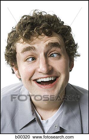 Close-up of a quirky young man crossing his eyes View Large Photo Image Stock Image - Close-up of a quirky young man crossing his eyes. Fotosearch
