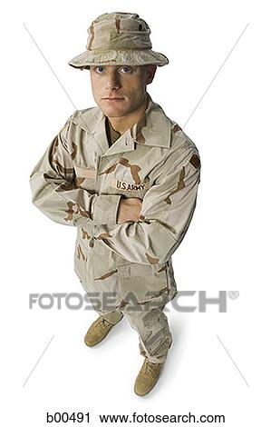 Close-up of a soldier in a military uniform View Large Photo Image Stock Image - Close-up of a soldier in a military uniform. Fotosearch