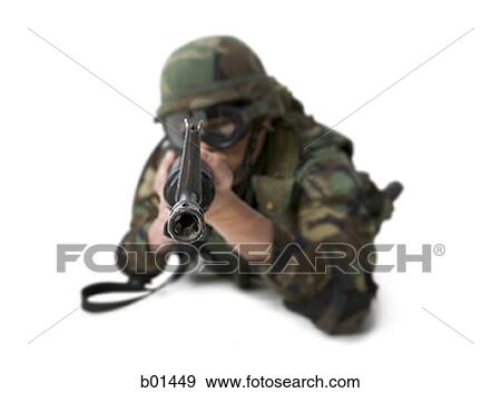 Stock Photo - Close-up of a soldier with his gun. Fotosearch