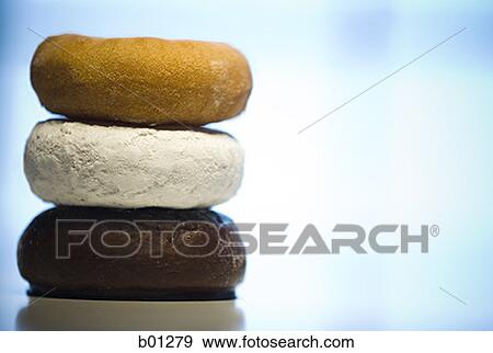 Close-up of a stack of donuts View Large Photo Image Stock Photo - Close-up of a stack of donuts. Fotosearch