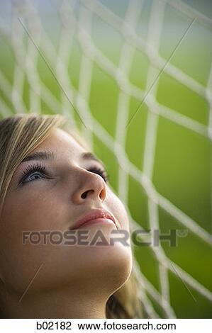 Close-up of a teenage girl on a hammock and looking up View Large Photo Image Stock Image - Close-up of a teenage girl on a hammock and looking up. Fotosearch