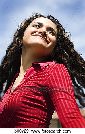 Close-up of a teenage girl smiling View Large Photo Image Stock Photo - Close-up of a teenage girl smiling. Fotosearch