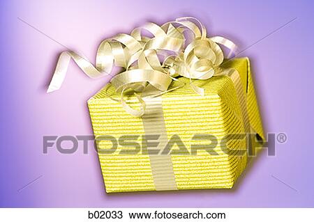 Close-up of a wrapped gift View Large Photo Image Stock Image - Close-up of a wrapped gift. Fotosearch