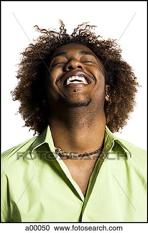 Close-up of a young Black man laughing View Large Photo Image Stock Image - Close-up of a young Black man laughing. Fotosearch