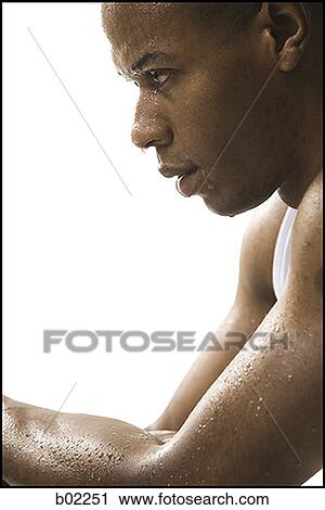 Close-up of a young man covered in sweat View Large Photo Image Stock Image - Close-up of a young man covered in sweat. Fotosearch
