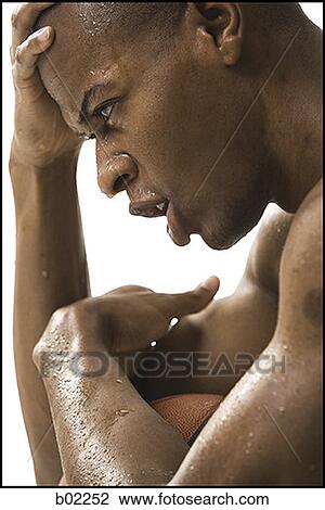Close-up of a young man covered in sweat View Large Photo Image Stock Image - Close-up of a young man covered in sweat. Fotosearch