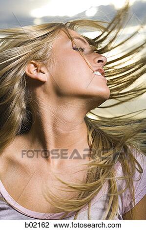Close-up of a young woman View Large Photo Image Stock Image - Close-up of a young woman. Fotosearch