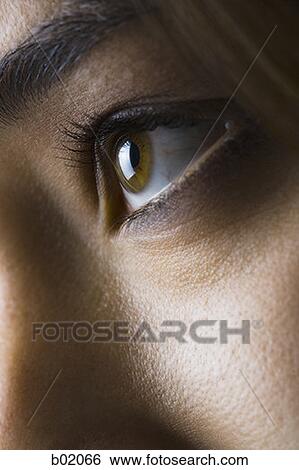 Stock Photograph - Close-up of a young woman's eye. Fotosearch