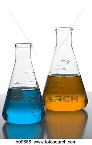 Close-up of beakers on a table in a laboratory with colored liquid View Large Photo Image Stock Photography - Close-up of beakers on a table in a laboratory with colored liquid. Fotosearch
