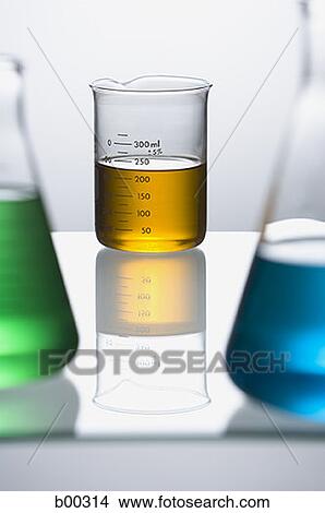 Close-up of beakers with colored liquid chemicals View Large Photo Image Picture - Close-up of beakers with colored liquid chemicals. Fotosearch