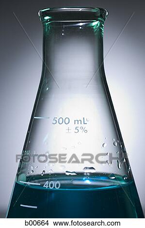 Close-up of beakers with colored liquid View Large Photo Image Picture - Close-up of beakers with colored liquid. Fotosearch