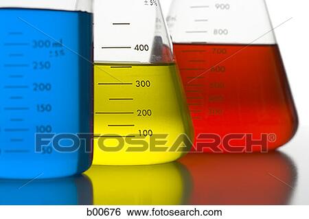 Close-up of beakers with colored liquid View Large Photo Image Stock Photograph - Close-up of beakers with colored liquid. Fotosearch
