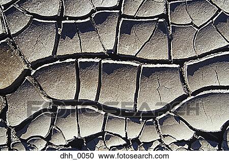 Stock Image - Close-up of cracked mud. Fotosearch