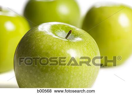 Close-up of four granny smith apples (aphis pomi) View Large Photo Image Stock Photo - Close-up of four granny smith apples (aphis pomi). Fotosearch