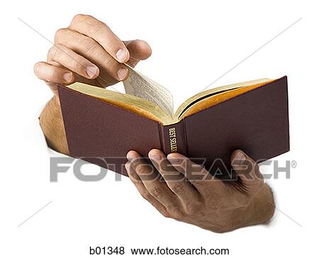 Pictures of Close-up of hands holding a book b01348 - Search Stock ...