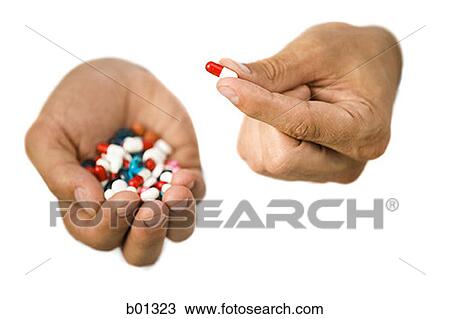 Close-up of hands holding pills View Large Photo Image Stock Image - Close-up of hands holding pills. Fotosearch