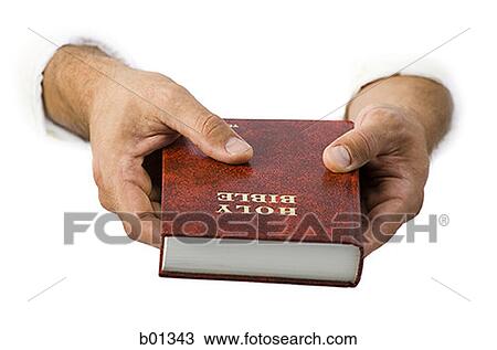 Close-up of hands holding the Bible View Large Photo Image Stock Image - Close-up of hands holding the Bible. Fotosearch