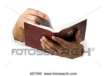 Close-up of hands turning the pages of the Bible View Large Photo Image Picture - Close-up of hands turning the pages of the Bible. Fotosearch
