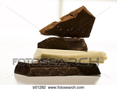 Close-up of pieces of chocolate View Large Photo Image Stock Image - Close-up of pieces of chocolate. Fotosearch