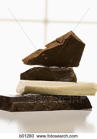 Close-up of pieces of chocolate View Large Photo Image Stock Image - Close-up of pieces of chocolate. Fotosearch